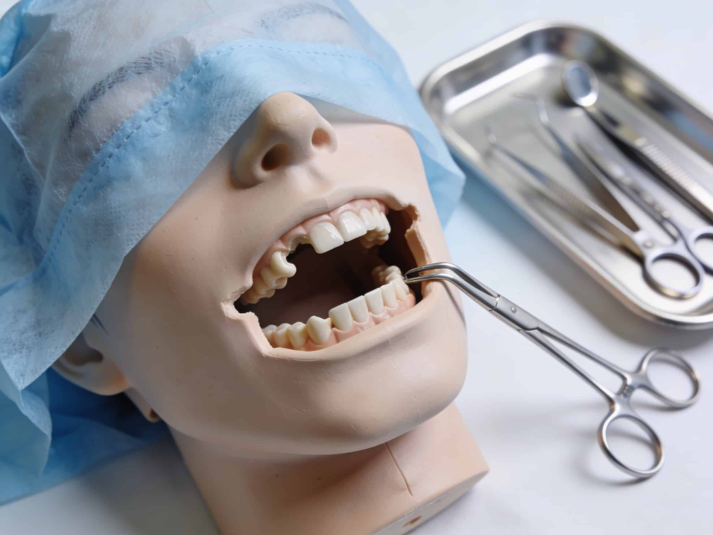 Emergency physician performing jaw reduction at Priority ER Odessa